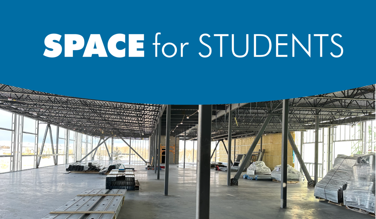 Blue banner at the top of the image that reads Space for Students. Below is the inside of a school that is under construction.